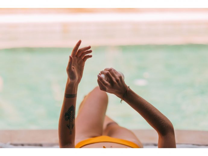 Airbrush Spray Tan vs Booth Spray Tan: Which Looks Better?