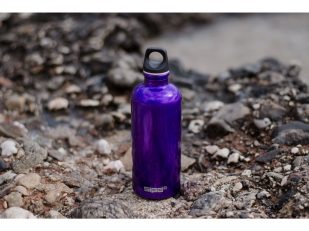 Purple glass water bottles for a modern luxury ritual