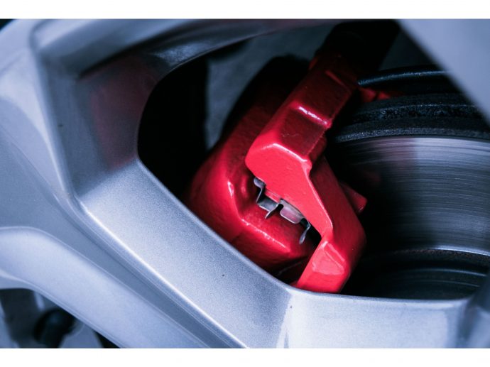 What Makes Professional Brake Pad Painting Durable?