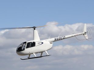 Robinson Delivers Two R44 Cadets to Texas