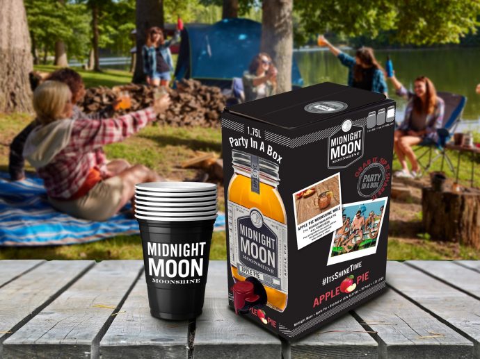 America's First Legal Moonshine Distillery Reveals New "Party in a Box" Packaging for Midnight Moon