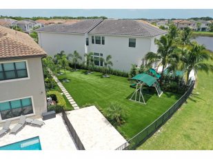 Lush Artificial Grass Transforms Waterfront Florida Home