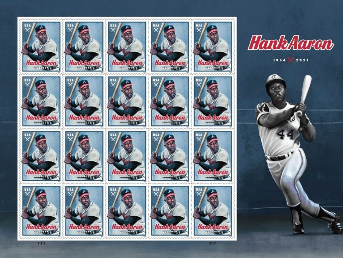 USPS Unveils Henry "Hank" Aaron Stamp On 50th Anniversary of Eclipsing Homerun Record