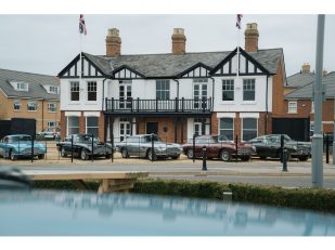 Cars & stars turn out for unique celebration of 70-year bond between Aston Martin & Newport Pagnell