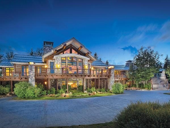 Luxury Lodge with 26-Seat Hot Tub and 18-Hole Putting Course Heads to Auction